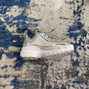 Fila women’s shimmery silver shoes